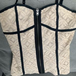 Zip up bustier/corset style tank.